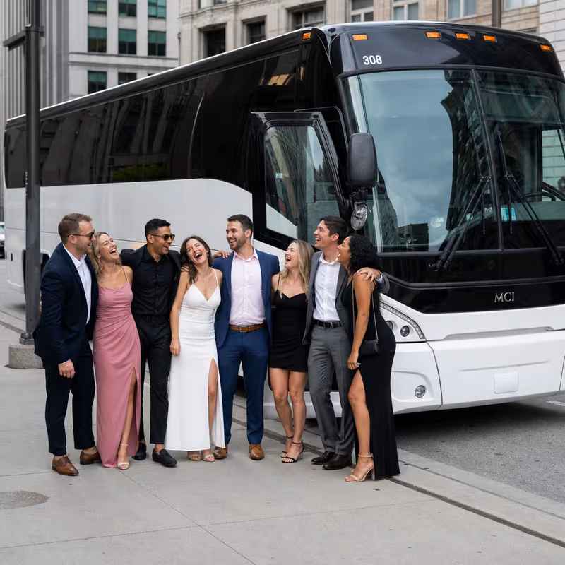Passengers loading luggage while boarding an Milwaukee group shuttle